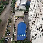 Nice And Comfort 2Br At Belmont Residence Puri Apartment By Travelio